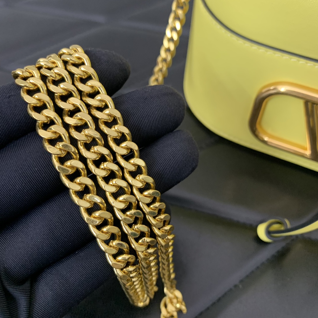 Valentino Garavani VLogo Signature Mini Bucket Bag in Yellow Nappa Leather 